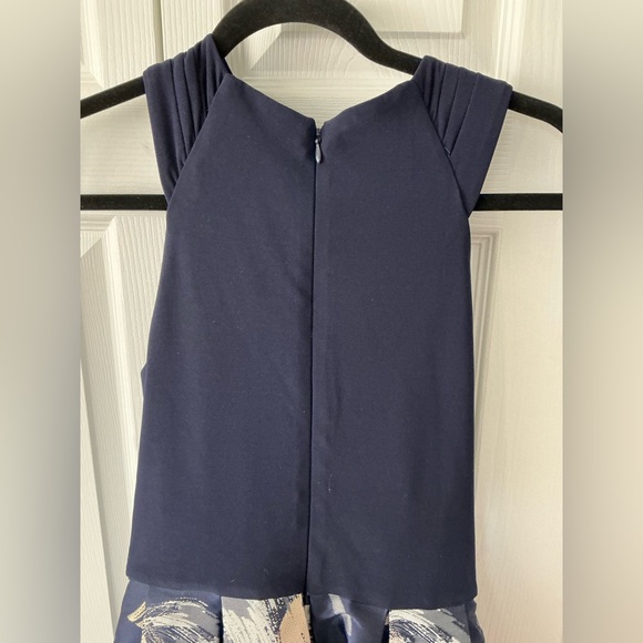 Elegant Navy Cross-Back Top with Floral Skirt - Picture 8 of 13